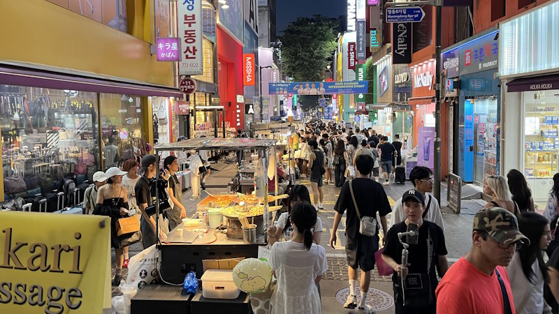Buying Street Food at a Night Market